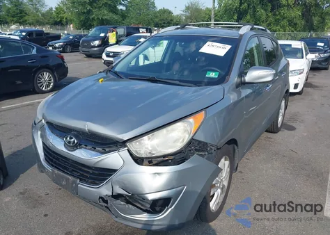 2012 Hyundai Tucson Limited from USA, damaged, VIN KM8JUCAC3CU381838
